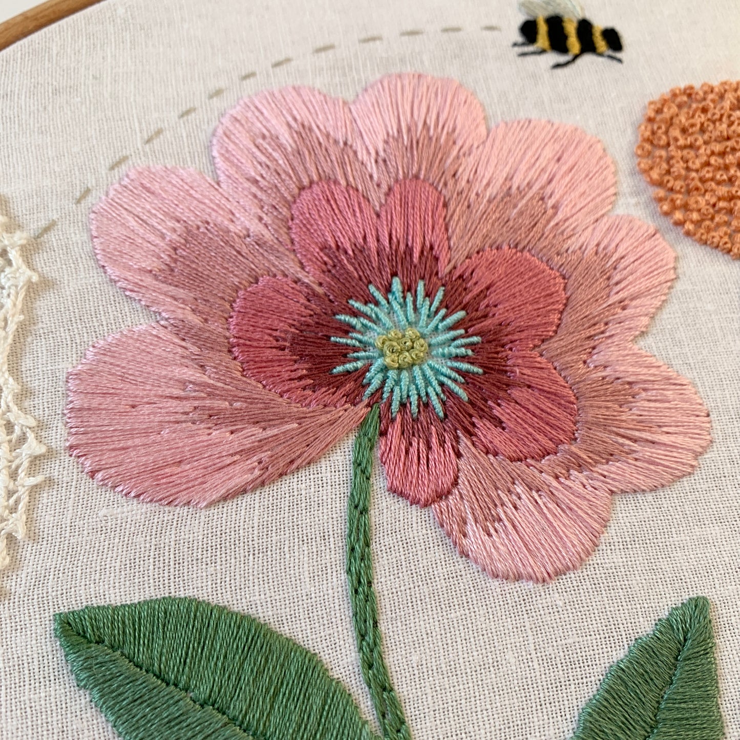 Original florals and insects hand embroidered hoop art.