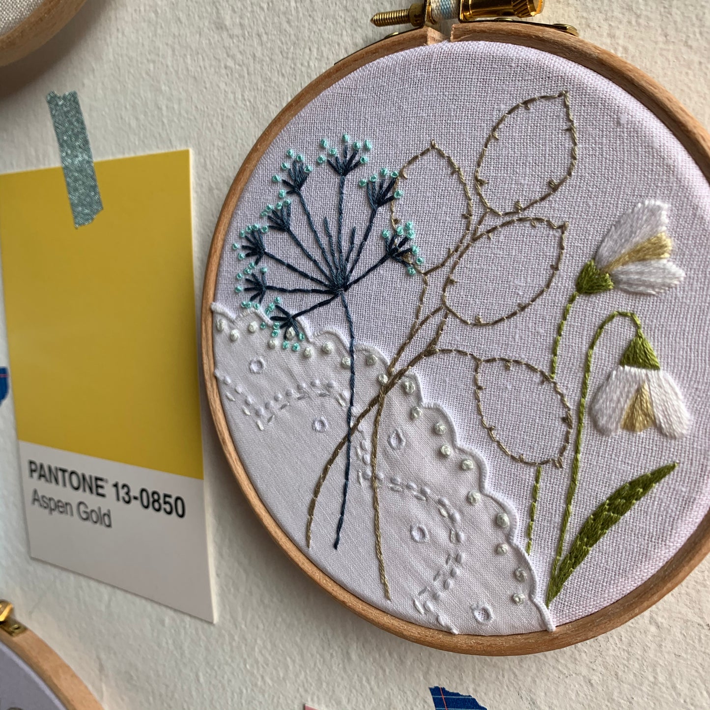 Snowdrop and honesty hand embroidery Art with lace.