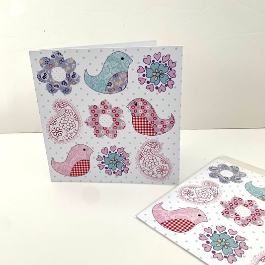 Greeting card with flower, bird and paisley.