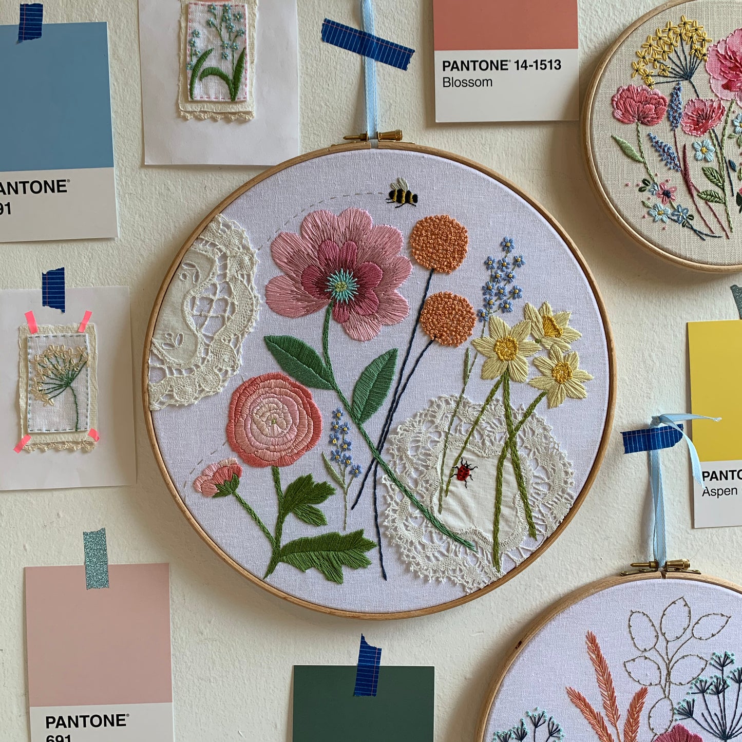 Original florals and insects hand embroidered hoop art.