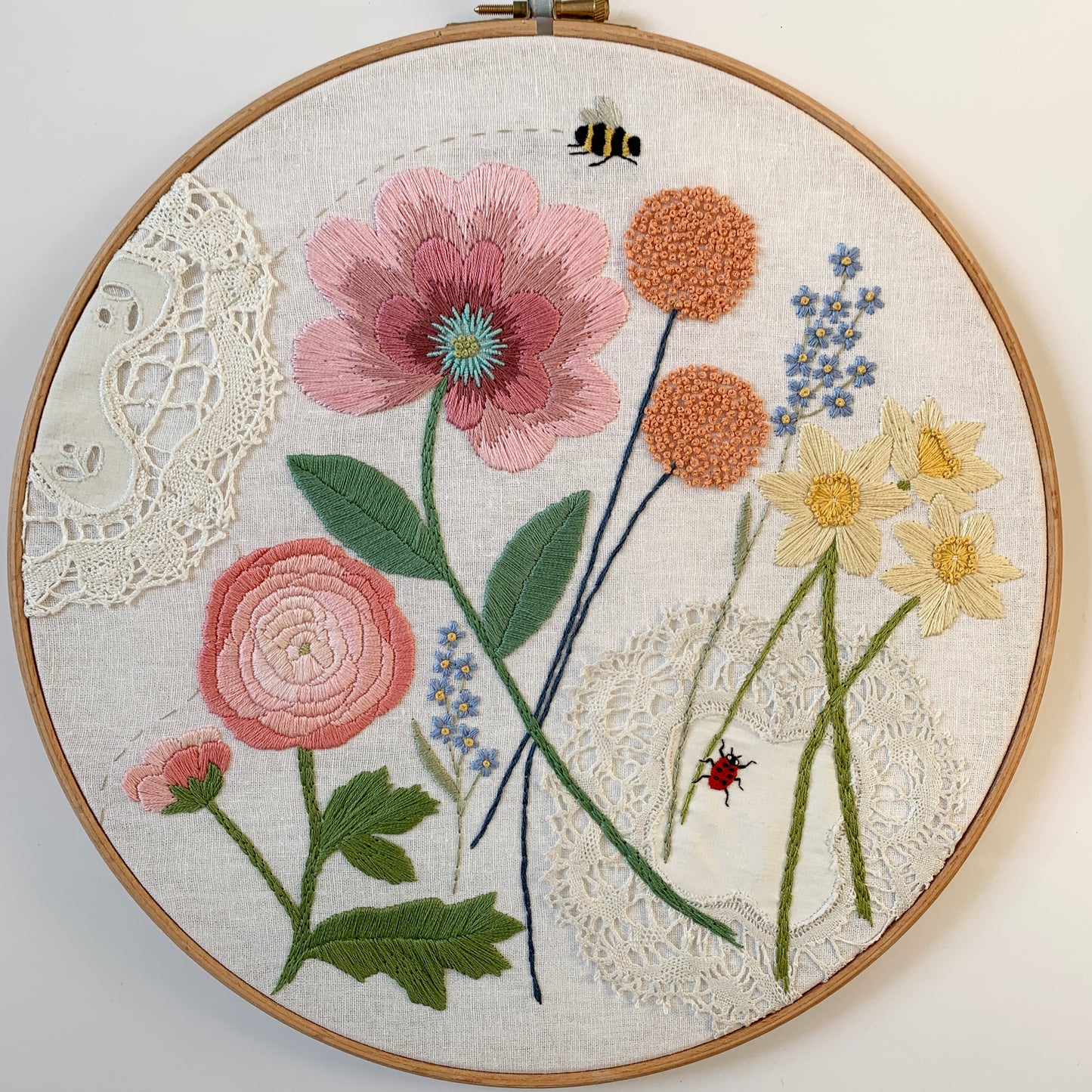 Original florals and insects hand embroidered hoop art.