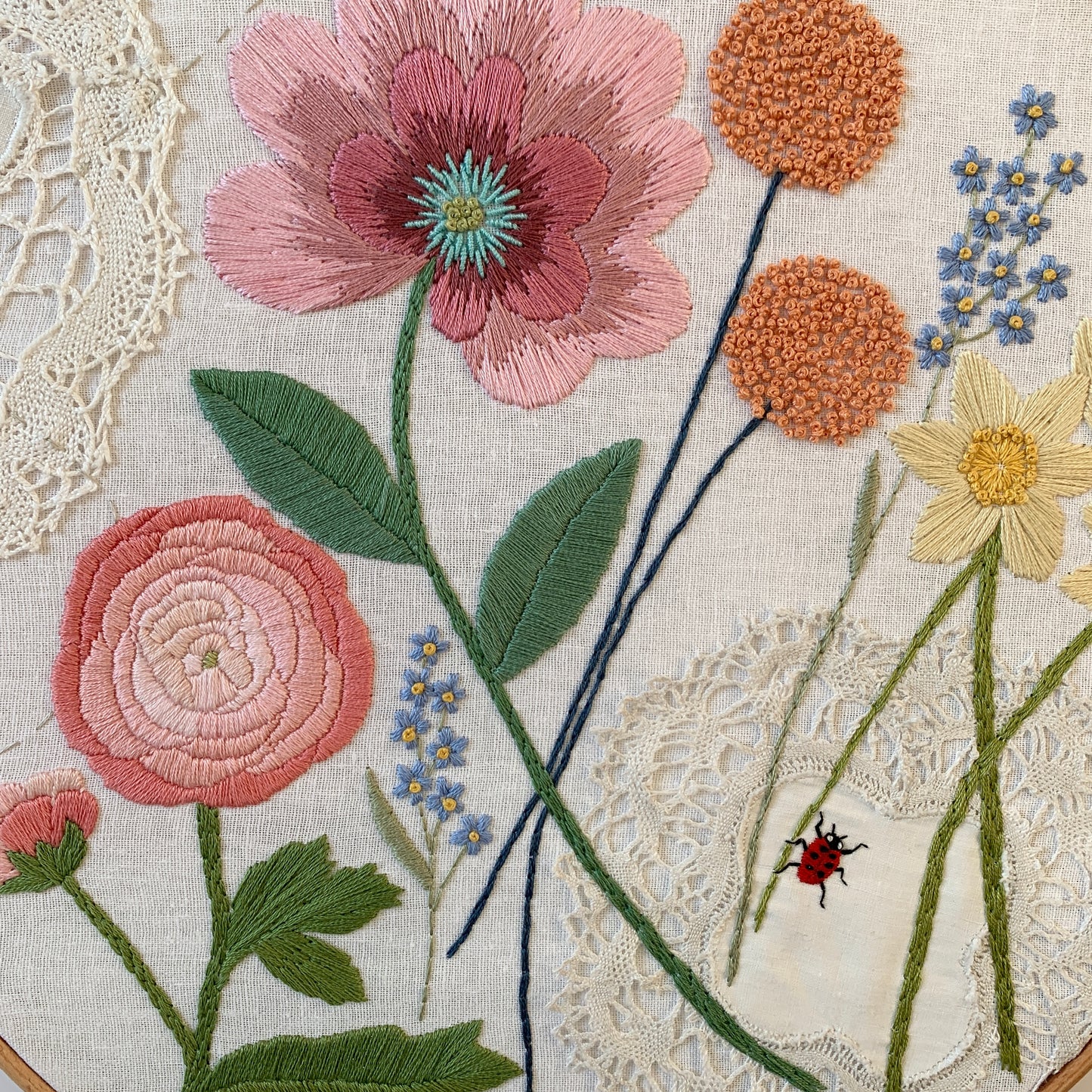 Original florals and insects hand embroidered hoop art.